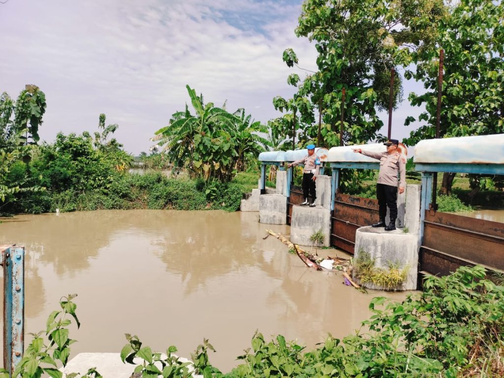 Antisipasi Banjir dan Kebakaran, Polsek Turi Gelar Patroli di Daerah Aliran Sungai