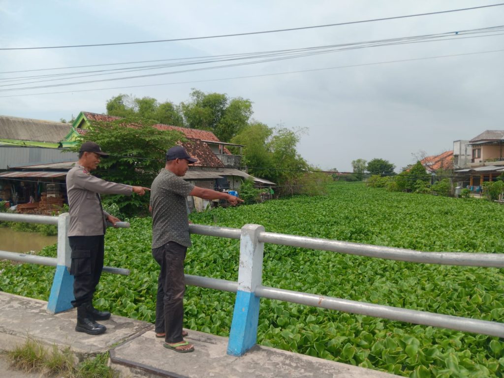 Polsek Turi Patroli Rawan Bencana di Tepi Sungai Kiringan: Antisipasi Banjir, Longsor, dan Kebakaran